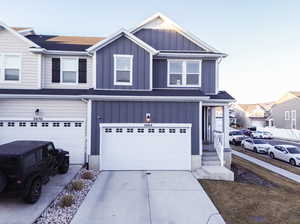 View of front of home with a garage