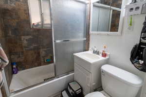 Full bathroom featuring bath / shower combo