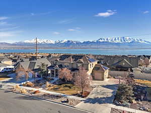 Property view of mountains with a water view