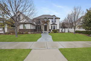 View of front of home featuring a front lawn