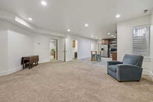 Interior space with light colored carpet