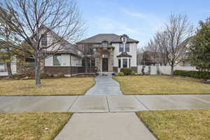 View of front of property with a front lawn