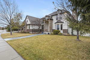 View of front of home featuring a front yard