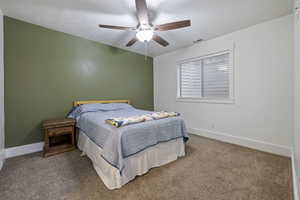 Bedroom with carpet flooring and ceiling fan