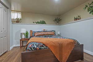 Bedroom featuring hardwood / wood-style floors