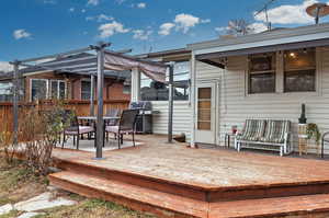 Wooden deck with a grill