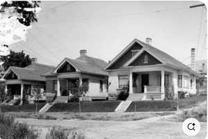 View of the front facade featuring a covered porch taken in 1904