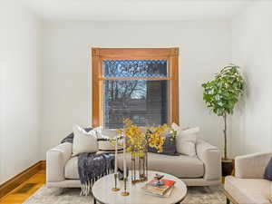 Living room with hardwood / wood-style floors