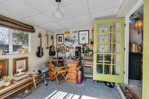 Home office with a paneled ceiling