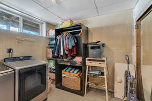 Clothes washing area with washing machine and dryer