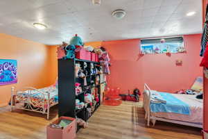 Bedroom featuring hardwood / wood-style floors