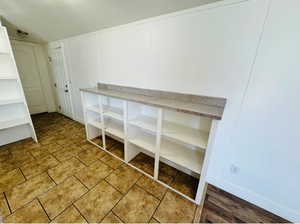 Laundry room with tile patterned flooring