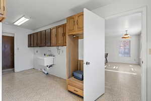 Kitchen with pendant lighting and sink