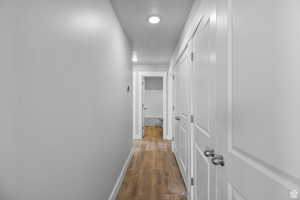 Hallway featuring dark hardwood / wood-style flooring