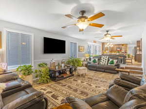 Living room with hardwood / wood-style flooring