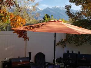 View of patio / terrace featuring grilling area and a mountain view