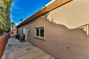 Side View with Additional Concrete, Walk Through Door from Garage