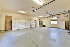 Oversize 3 Car Garage with Cabinets and Water Softener System