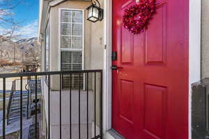 Doorway to property featuring a mountain view