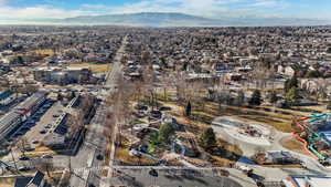 Birds eye view of property featuring a mountain view