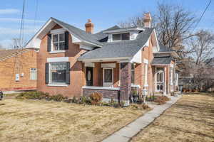 Exterior space featuring a front yard