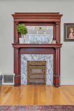 Interior details featuring hardwood / wood-style floors