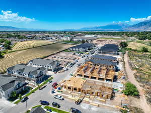 Birds eye view of property with a mountain view