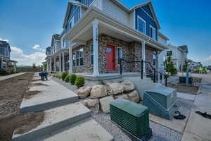 View of home's exterior with covered porch