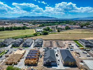 Birds eye view of property with a mountain view