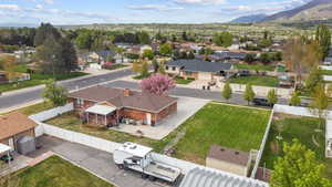 Birds eye view of property featuring a residential view and a mountain view
