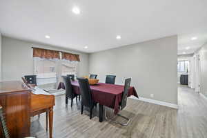 Dining room featuring light hardwood / wood-style flooring