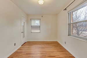 Spare room featuring light hardwood / wood-style floors