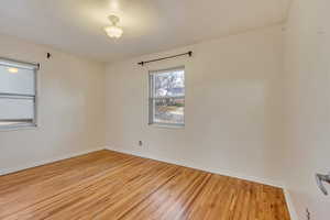 Spare room featuring light hardwood / wood-style flooring