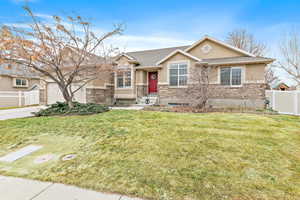 View of front of home featuring a front lawn