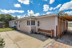 Back of property featuring a patio area