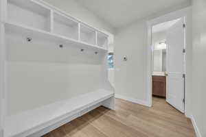 Mudroom featuring light hardwood / wood-style flooring