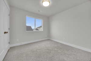 View of carpeted empty room