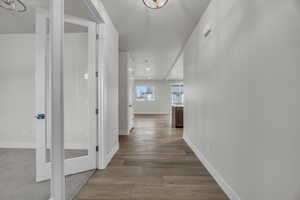 Corridor featuring light hardwood / wood-style flooring