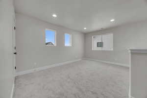 Spare room with light carpet