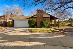 View of front of home featuring a garage