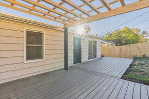 Wooden terrace with a pergola