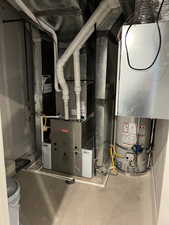 Utility room with gas water heater