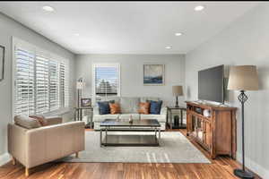 Living room with light wood-type flooring