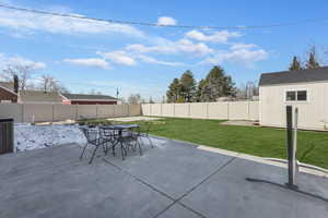 View of patio / terrace with a storage unit