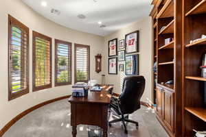 Office area featuring carpet flooring