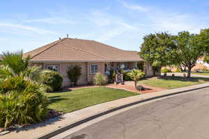 View of front of property with a front yard