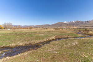 Property view of mountains featuring a rural view