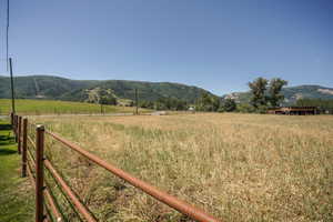 Property view of mountains featuring a rural view