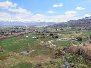 Birds eye view of property featuring a rural view and a mountain view