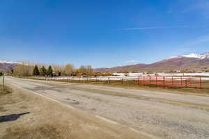 View of road featuring a mountain view and a rural view